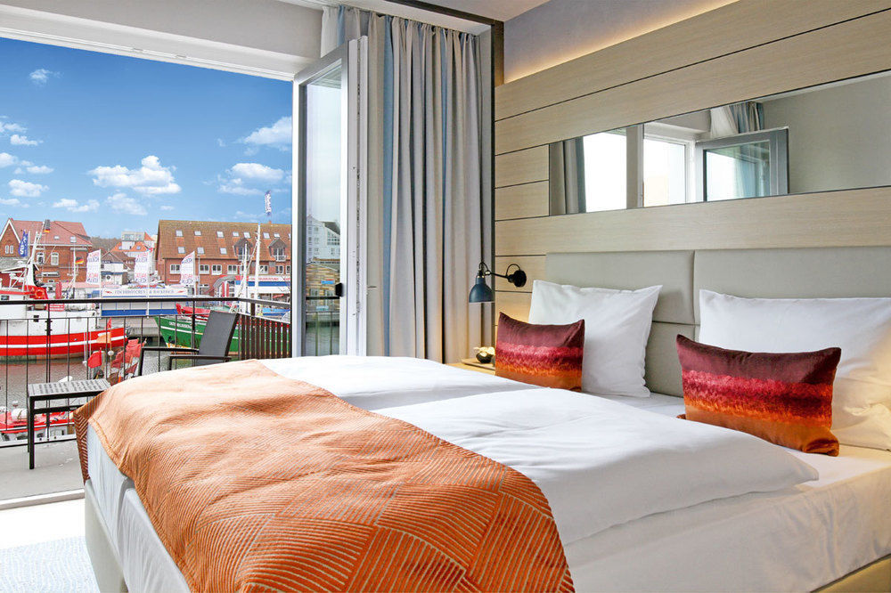 Hafenhotel Meereszeiten ไฮลิเกนฮาเฟิน ภายนอก รูปภาพ